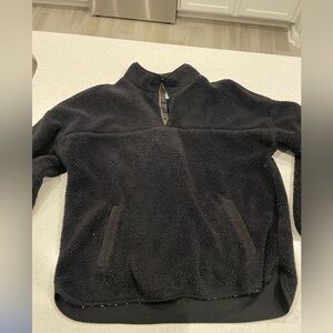 Women’s black fleece sweater